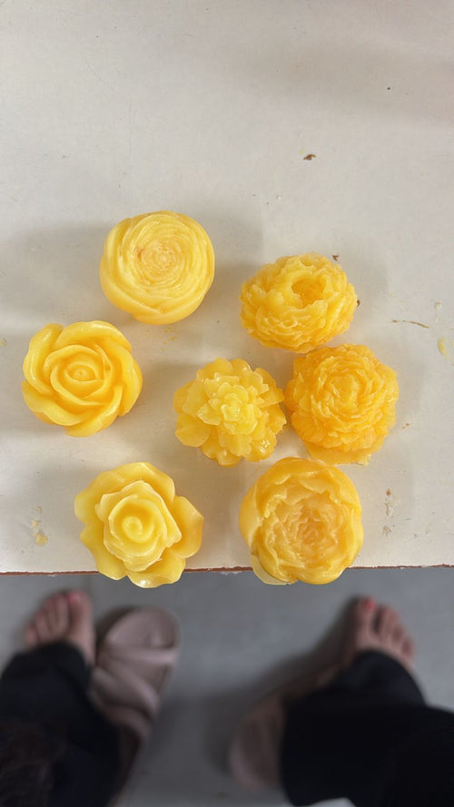 Close-up of sunrise yellow handcrafted soap roses showing petal detail